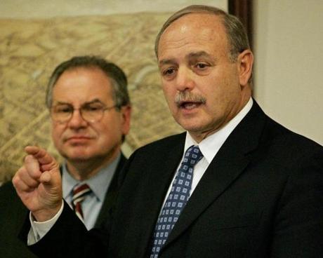 Massachusetts Speaker of the House Sal DiMasi, right, faces reporters as House Ways and Means Committee Chairman Robert DeLeo, D-Winthrop, left, looks on during the unveiling of a Democratic state budget proposal at the Statehouse in Boston, Monday, April 10, 2006. House Democratic lawmakers presented the $25.27 billion budget proposal Monday that represents a 5.7 percent increase over current spending and sets aside $200 million for a new health care plan. (AP Photo/Steven Senne) Library Tag 06232006 Metro
